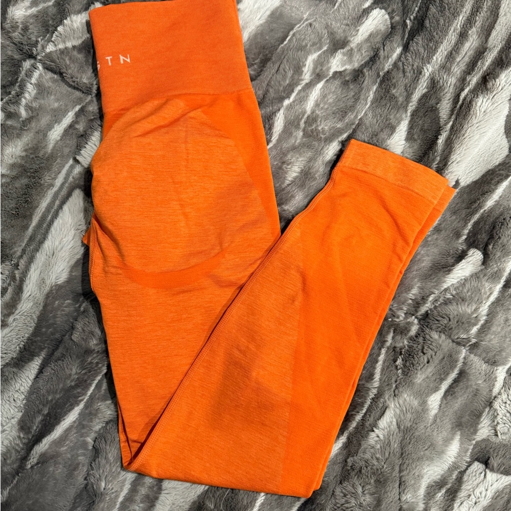 NVGTN Orange Leggings Athletic Wear